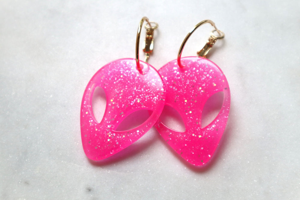 Pink glittery alien earrings