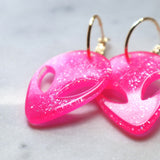 Pink glittery alien earrings