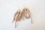 Beige beaded earrings