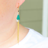 Long golden earrings