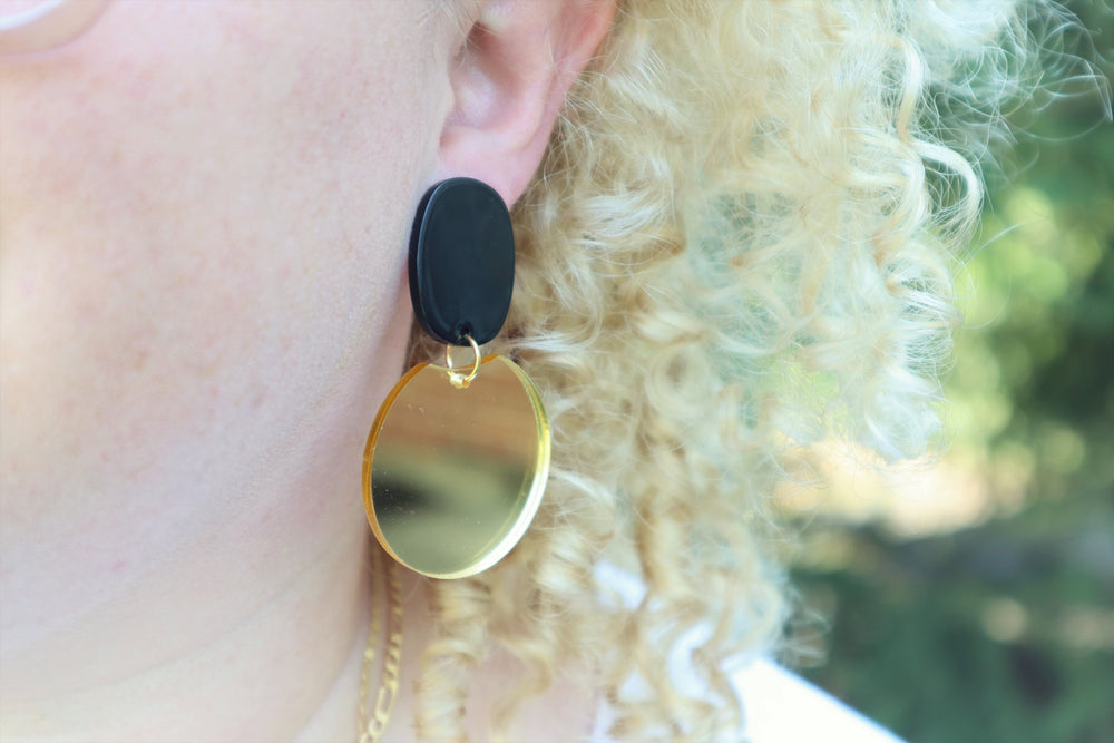 Fancy black and mirror-gold earrings