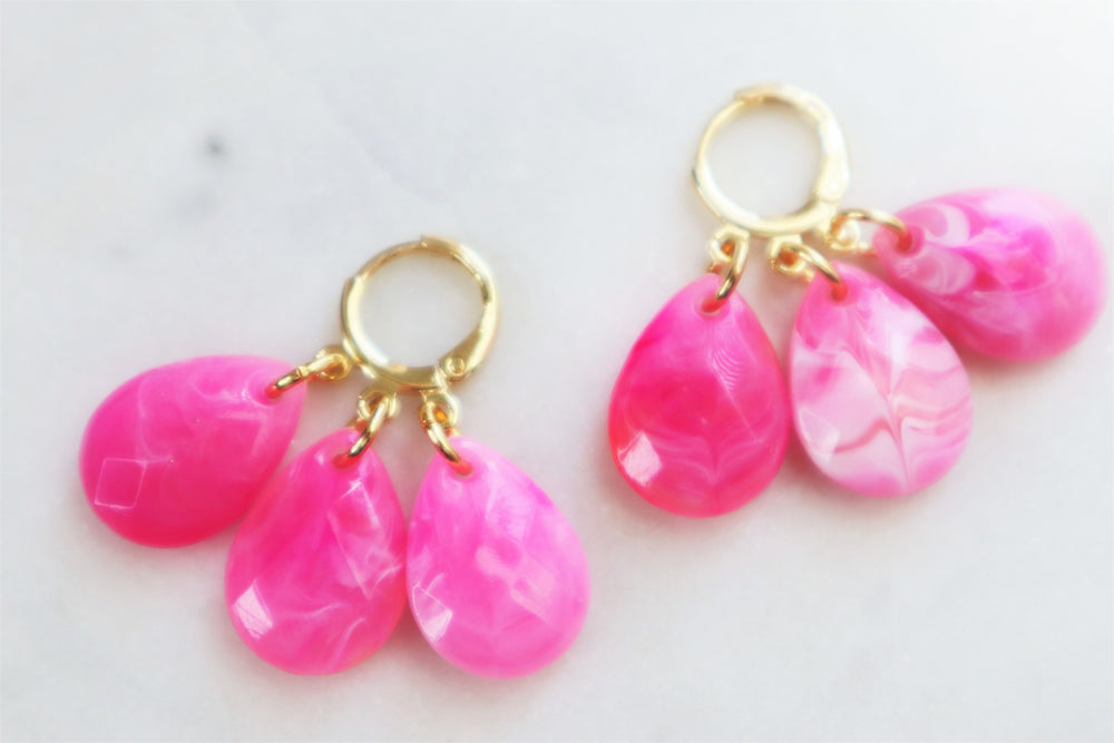 Three pink teardrops earrings