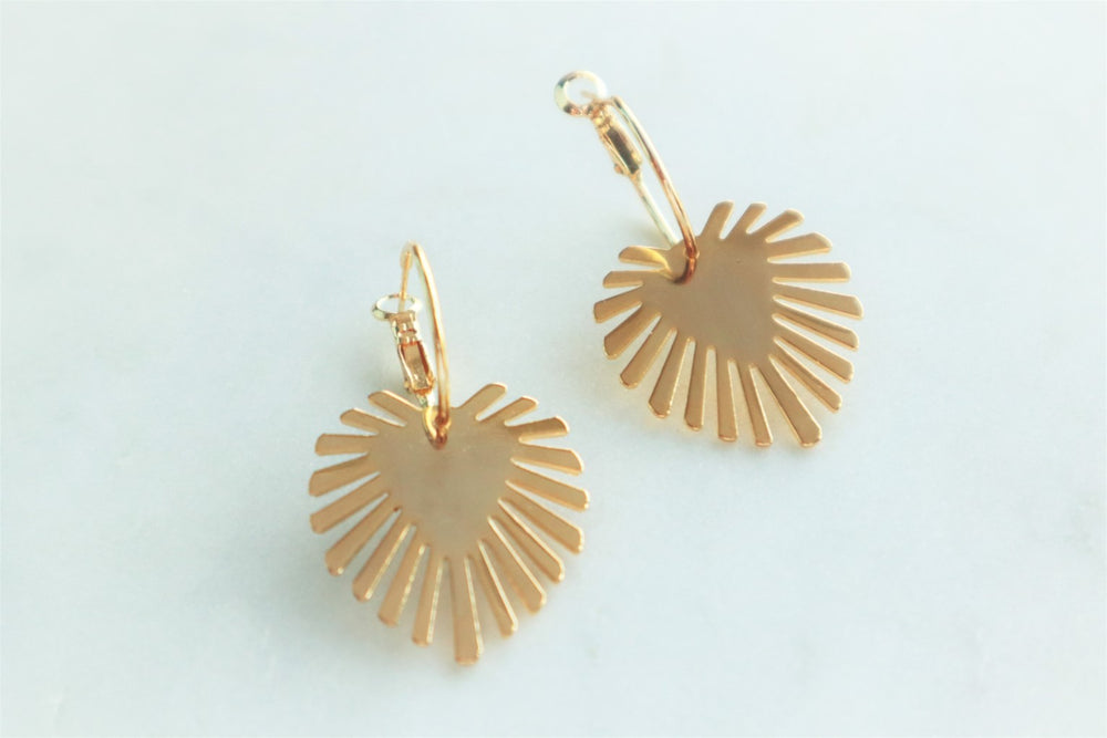 Heart burst earrings