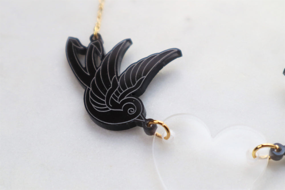 Birds and clear heart necklace